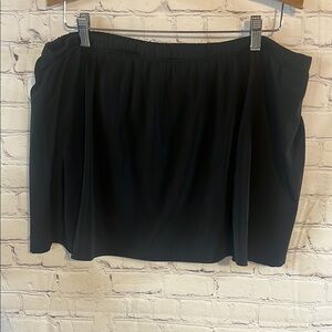 Black swim Skirt with attached brief underneath. By Avenue. Exc condition